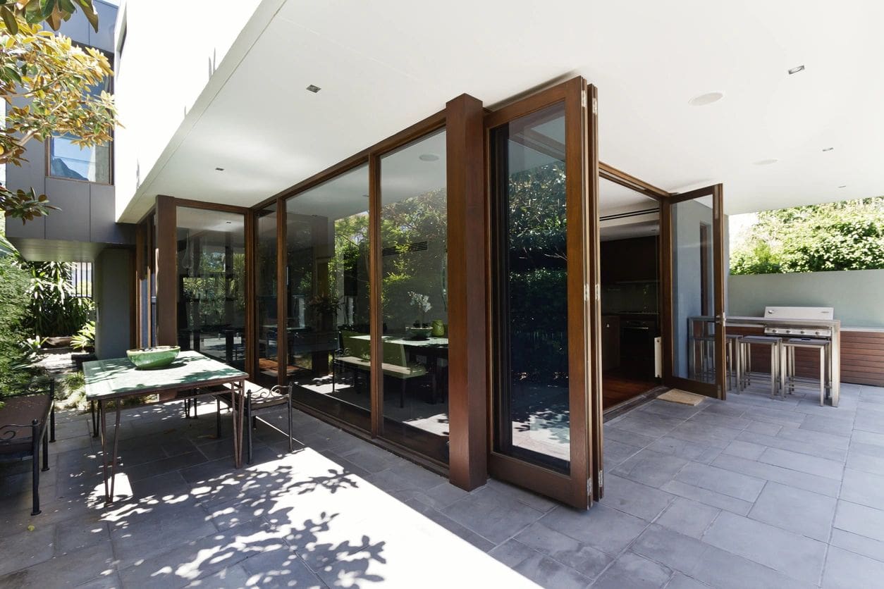 Modern patio with folding glass doors